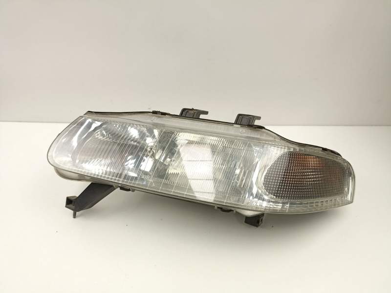 Recambio de faro izquierdo para rover 420 2.0 g referencia OEM IAM XBC103570  