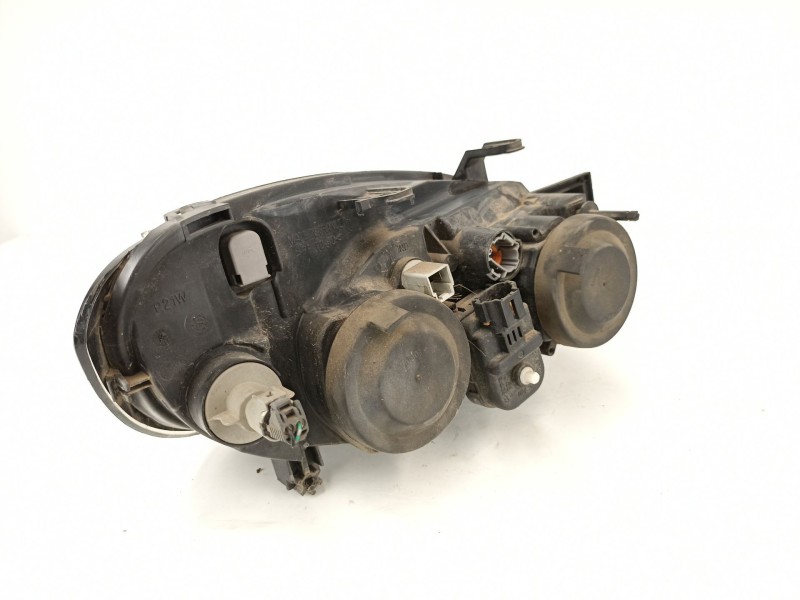 Recambio de faro izquierdo para nissan primera 1.6 g referencia OEM IAM 89006288  