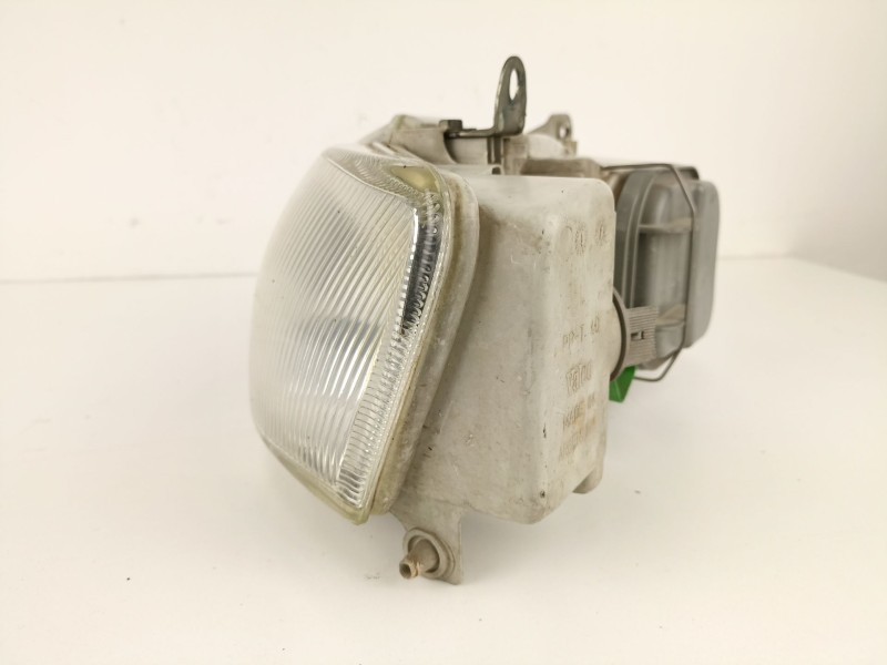 Recambio de faro izquierdo para ford escort 1.8 d/rfs referencia OEM IAM   