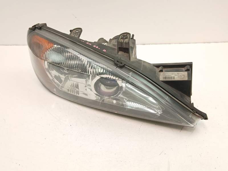 Recambio de faro derecho para nissan primera (p11) 2.0 td referencia OEM IAM 260109F600 89003045 