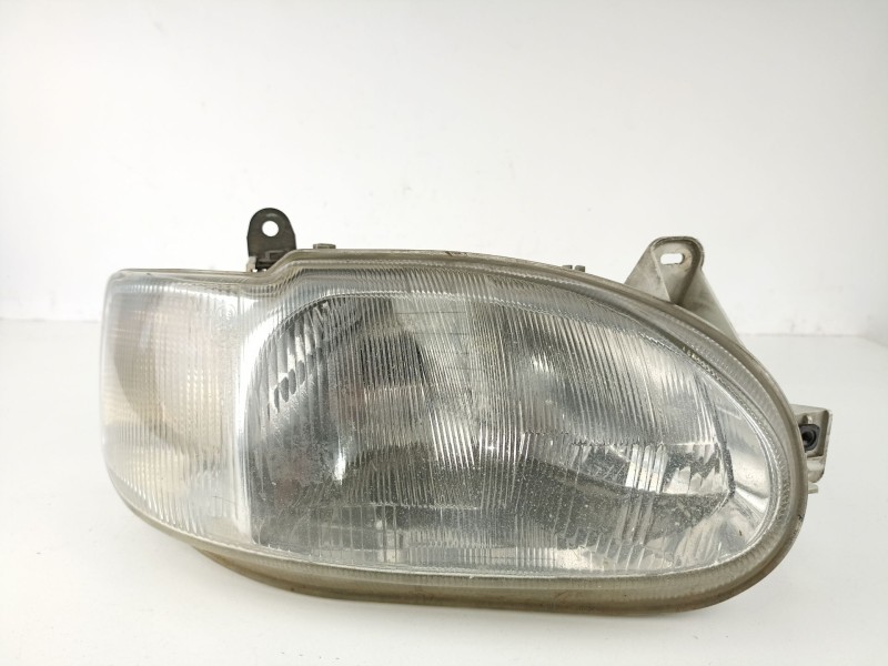 Recambio de faro derecho para ford escort 1.8 d/rfs referencia OEM IAM 1076554  