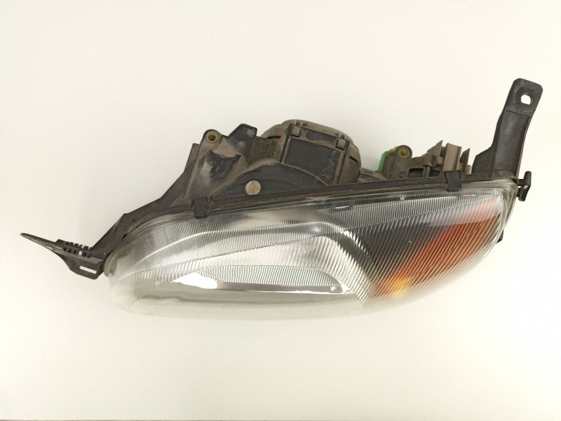Recambio de faro izquierdo para ford fiesta 1.3 g referencia OEM IAM 1127897 0301173301 YS6113006AK