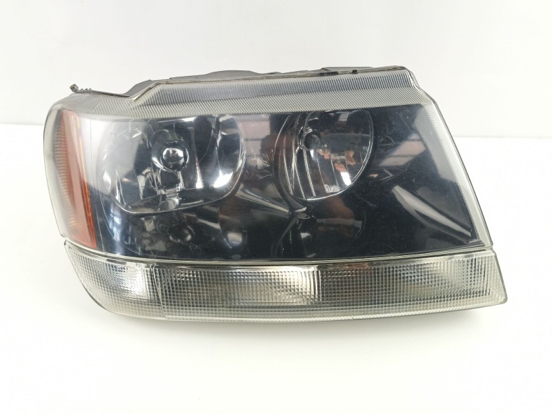 Recambio de faro derecho para jeep gr.cherokee (wj/wg) 3.1 td cat referencia OEM IAM 55155144  MJP101A610