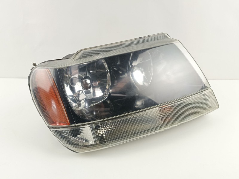 Recambio de faro derecho para jeep gr.cherokee (wj/wg) 3.1 td cat referencia OEM IAM 55155144  MJP101A610