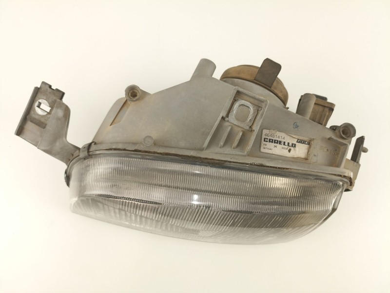 Recambio de faro izquierdo para fiat punto berl. (176) 1.7 turbodiesel cat referencia OEM IAM 46481414 36470748 39770381