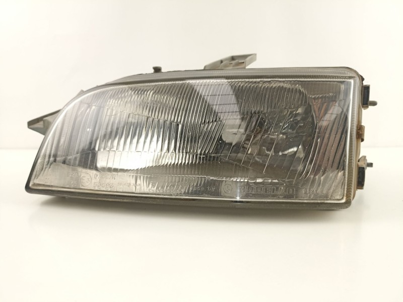 Recambio de faro izquierdo para fiat punto berl. (176) 1.7 turbodiesel cat referencia OEM IAM 46481414 36470748 39770381