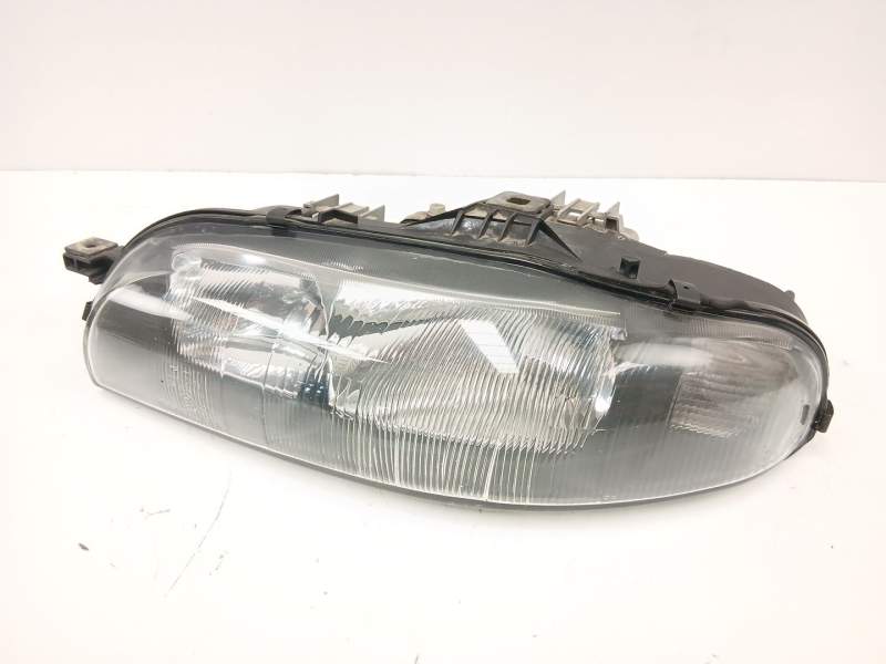 Recambio de faro izquierdo para fiat bravo i (182_) 1.9 jtd referencia OEM IAM 46523123  