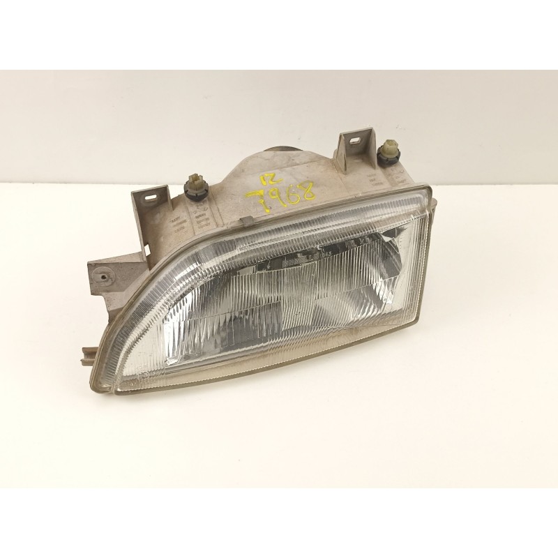 Recambio de faro izquierdo para ford escort 1.3 g referencia OEM IAM 91AG13006SA2A  