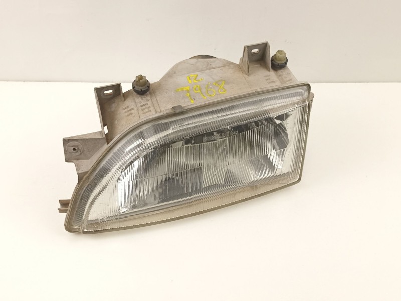 Recambio de faro izquierdo para ford escort 1.3 g referencia OEM IAM 91AG13006SA2A  