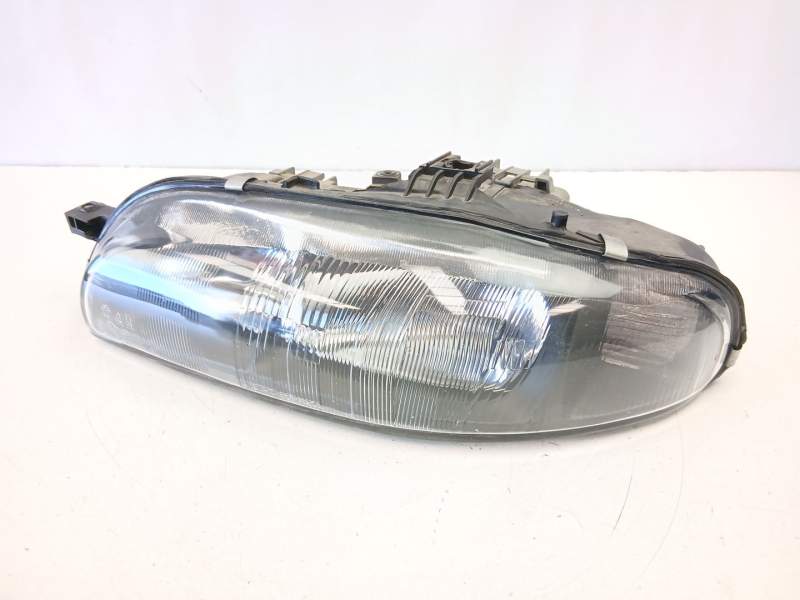 Recambio de faro izquierdo para fiat bravo i (182_) 1.9 jtd referencia OEM IAM 46523123  