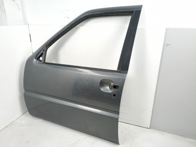 Recambio de puerta delantera izquierda para nissan terrano/terrano.ii (r20) aventura referencia OEM IAM 801017F031  