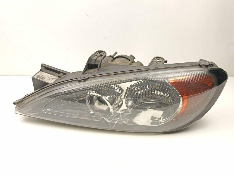 Recambio de faro izquierdo para nissan primera 2.0 td referencia OEM IAM 260609F600 89003044 