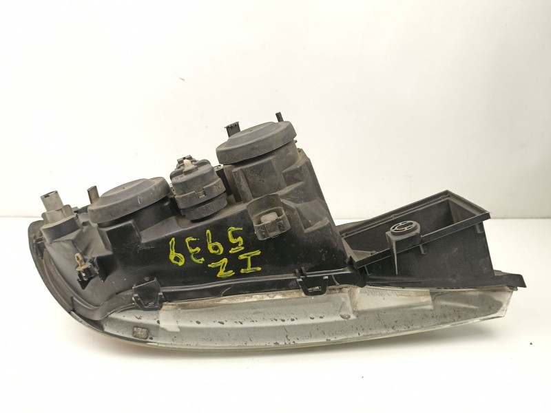 Recambio de faro izquierdo para nissan primera 2.0 td referencia OEM IAM 260609F600 89003044 