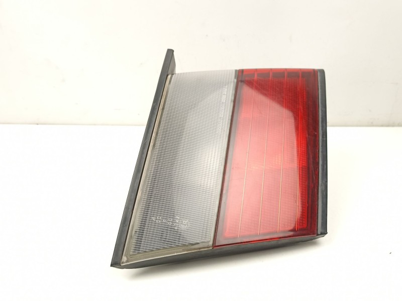 Recambio de piloto porton izquierdo para nissan almera i hatchback (n15) 1.6 referencia OEM IAM 265590N828  