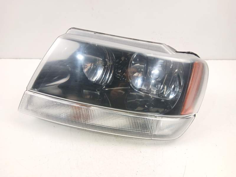 Recambio de faro izquierdo para jeep grand cherokee 3.1 td automatico referencia OEM IAM 55155145  