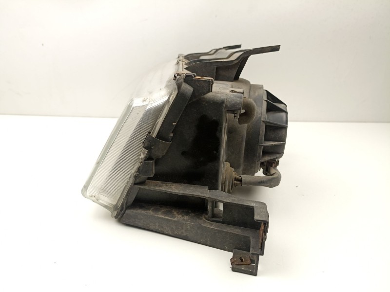 Recambio de faro izquierdo para ssangyong musso 2.9 td /om662 referencia OEM IAM 8310105100X  