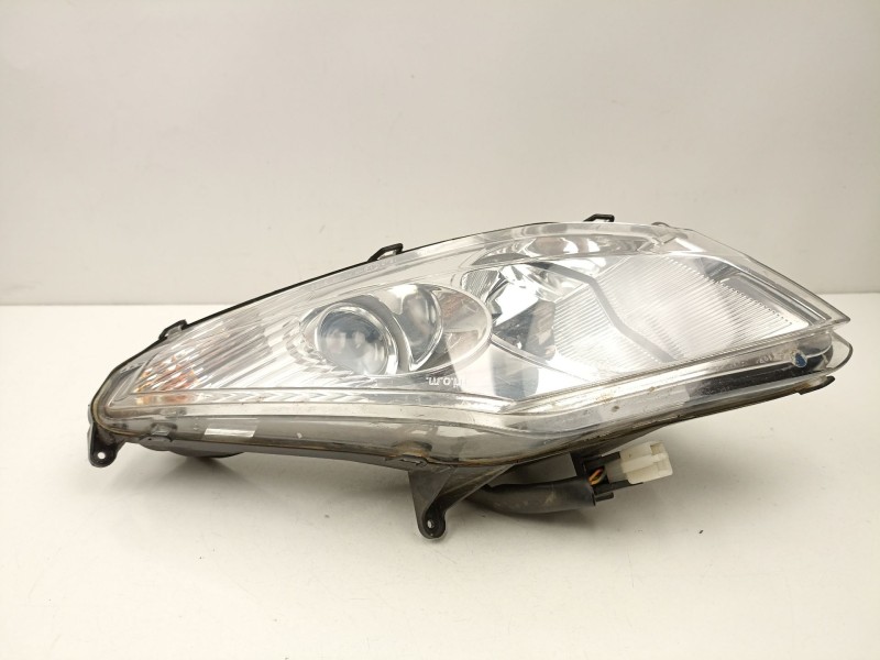 Recambio de faro izquierdo para peugeot satelis satelis 250 (j2) referencia OEM IAM 766941  