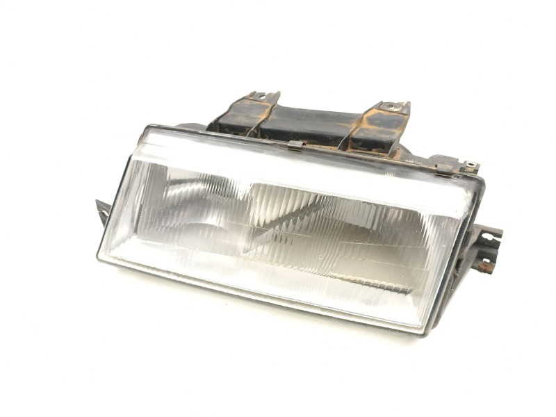 Recambio de faro izquierdo para ssangyong musso (fj) 2.9 td referencia OEM IAM 8310105100X  