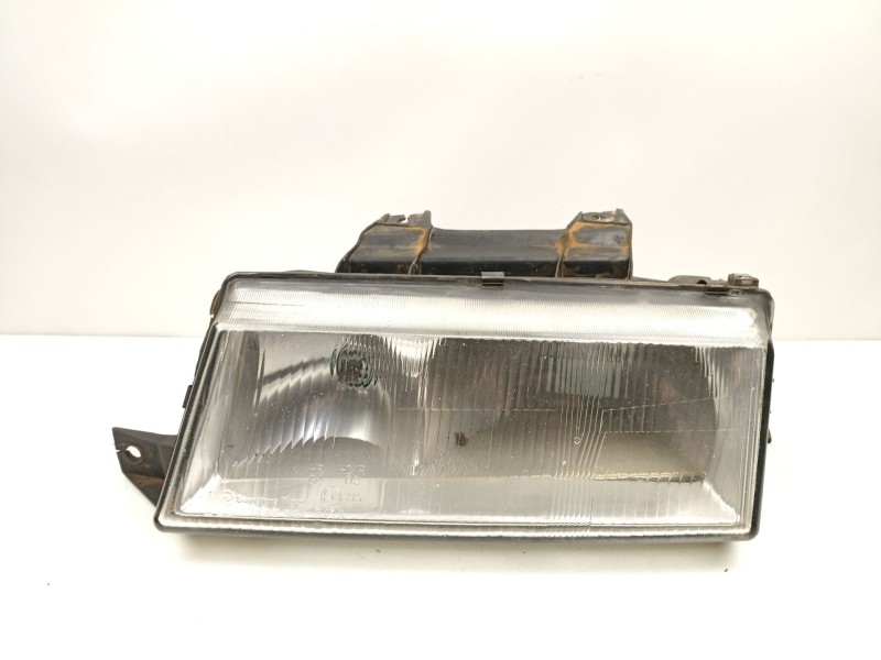 Recambio de faro izquierdo para ssangyong musso (fj) 2.9 td referencia OEM IAM 8310105100X  