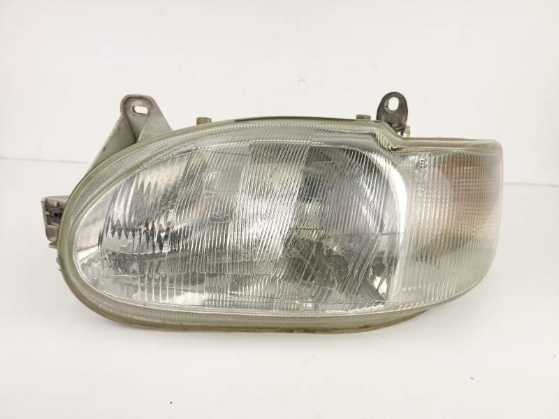 Recambio de faro izquierdo para ford escort 1.8 d/rfs referencia OEM IAM 1076561  