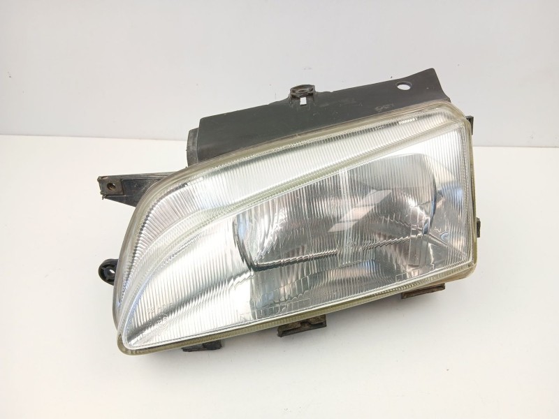Recambio de faro izquierdo para peugeot partner 1.9 d referencia OEM IAM 6204P8  