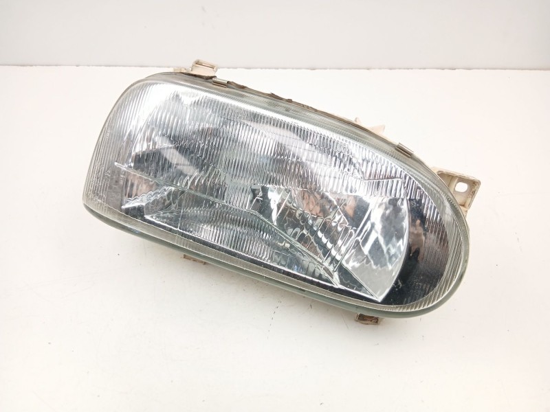 Recambio de faro derecho para volkswagen golf 1.8 g referencia OEM IAM 1H6941018AM  