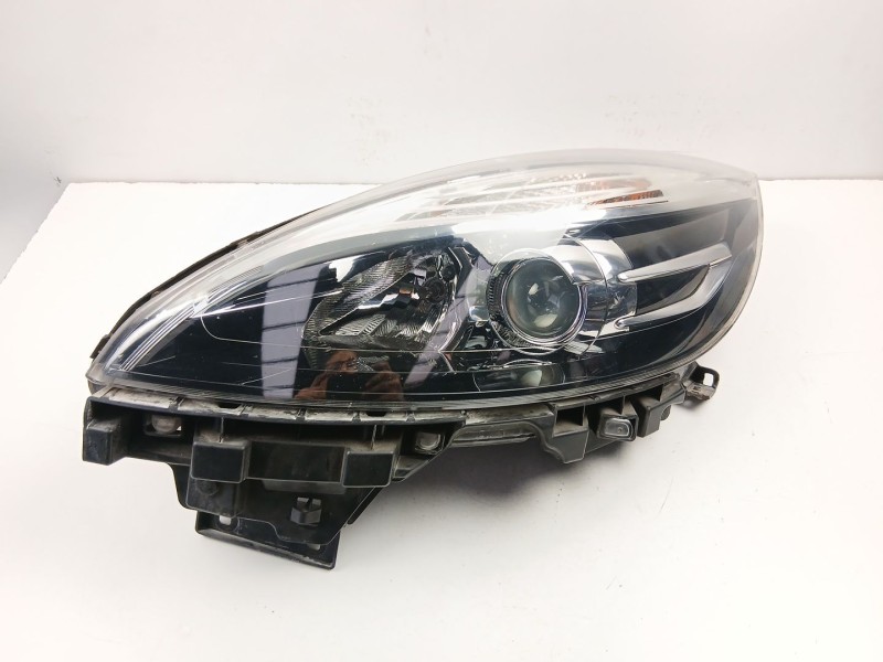 Recambio de faro izquierdo para renault scénic iii (jz0/1_) 1.5 dci referencia OEM IAM 260601946R  