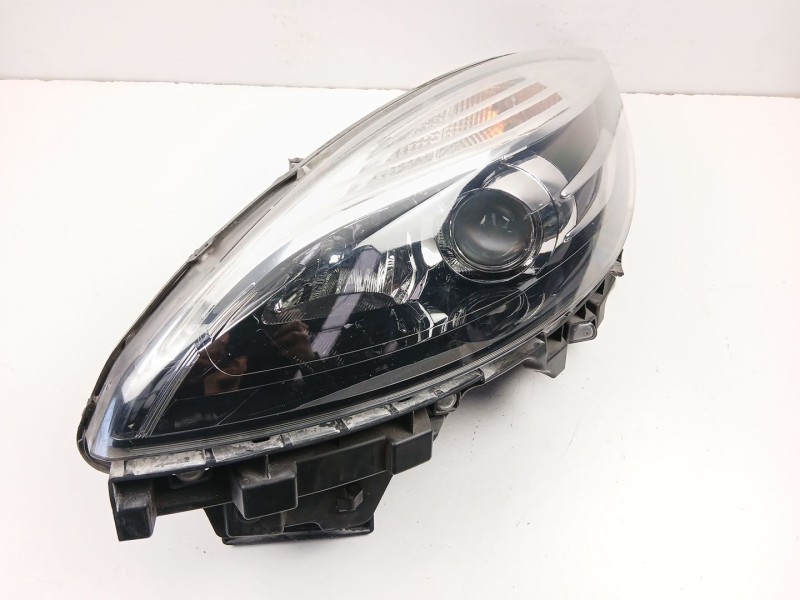 Recambio de faro izquierdo para renault scénic iii (jz0/1_) 1.5 dci referencia OEM IAM 260601946R  