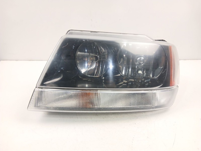 Recambio de faro izquierdo para jeep grand cherokee 3.1 td automatico referencia OEM IAM 55155145  