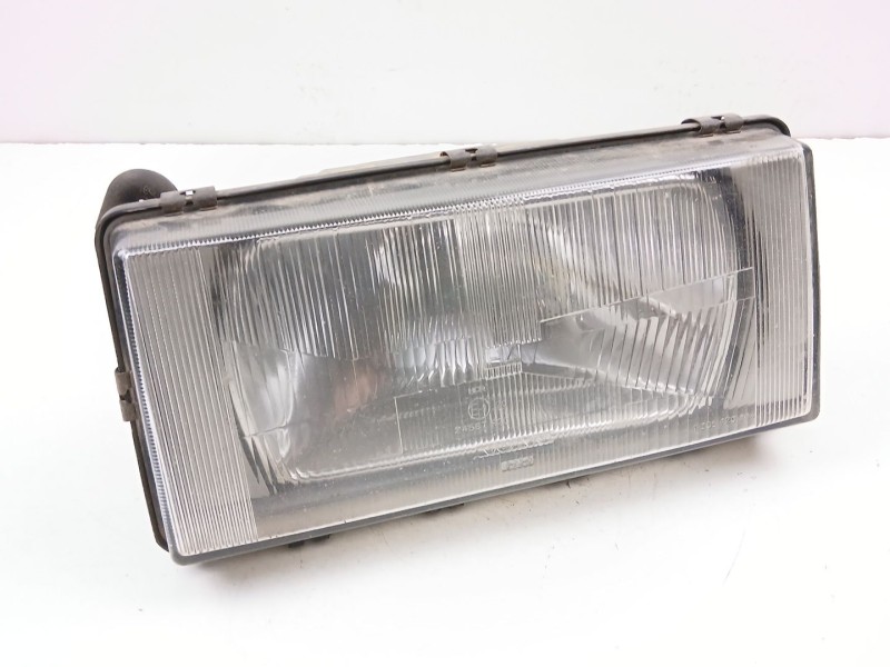 Recambio de faro izquierdo para volvo 740 kombi (745) 2.3 referencia OEM IAM 3534169  