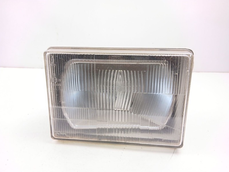 Recambio de faro izquierdo para nissan trade caja/chasis 2.8 d referencia OEM IAM 015065230  