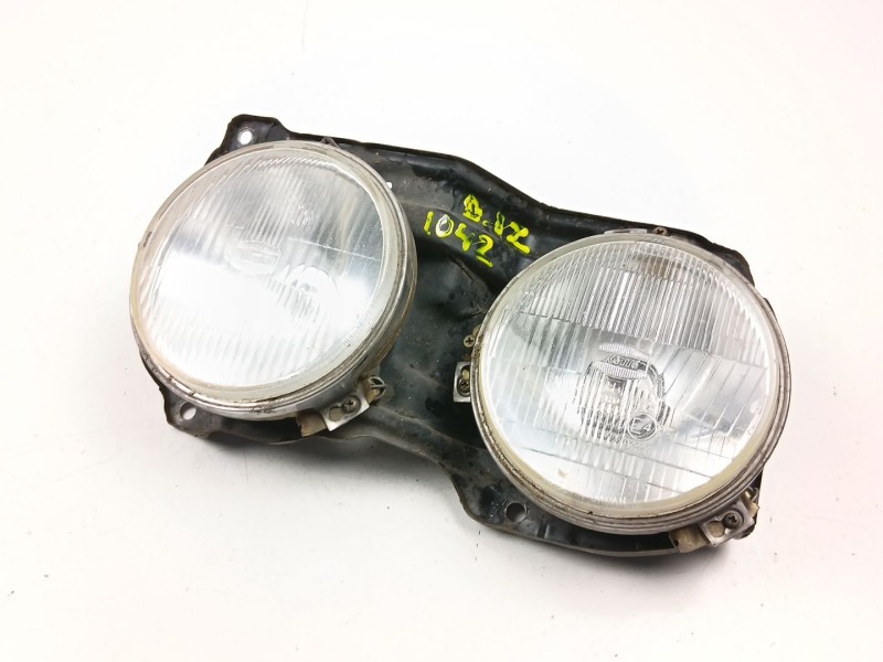Recambio de faro izquierdo para nissan vanette 2.0 d -ld20-ii referencia OEM IAM 26125Y9526  