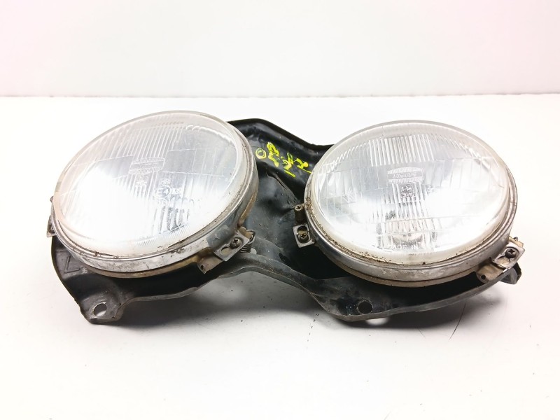 Recambio de faro izquierdo para nissan vanette 2.0 d -ld20-ii referencia OEM IAM 26125Y9526  