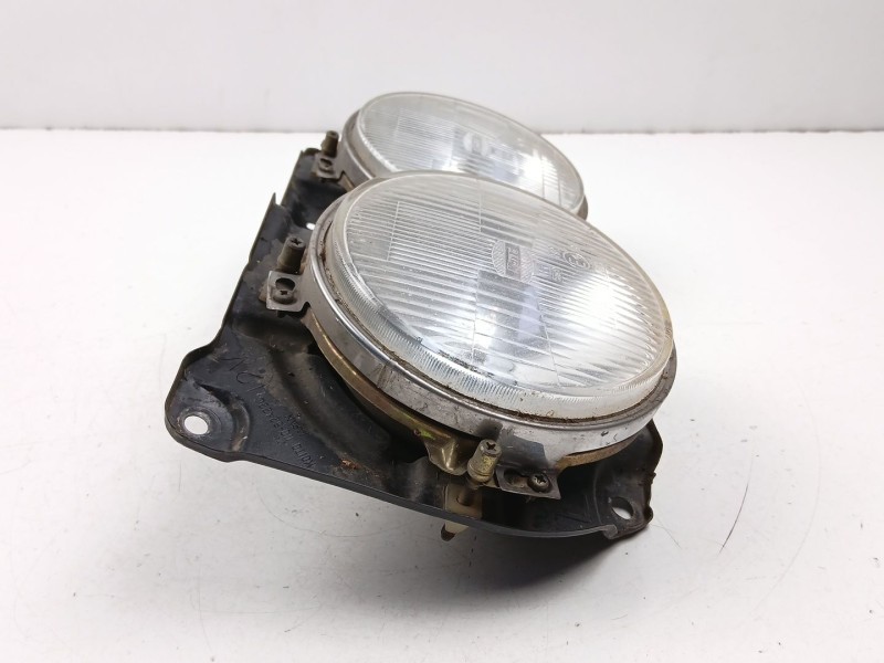 Recambio de faro izquierdo para nissan vanette 2.0 d -ld20-ii referencia OEM IAM 26125Y9526  