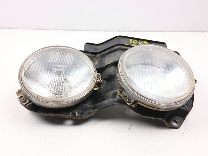 Recambio de faro derecho para nissan vanette 2.0 d -ld20-ii referencia OEM IAM 26120Y9527  
