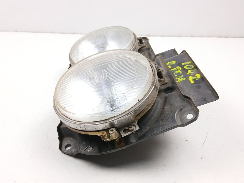 Recambio de faro derecho para nissan vanette 2.0 d -ld20-ii referencia OEM IAM 26120Y9527  