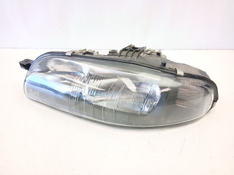 Recambio de faro izquierdo para fiat bravo i (182_) 1.9 jtd referencia OEM IAM 46523123  