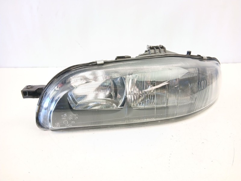Recambio de faro izquierdo para fiat bravo i (182_) 1.9 jtd referencia OEM IAM 46523123  