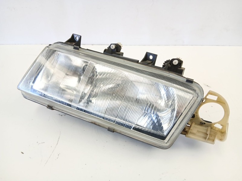 Recambio de faro izquierdo para lancia delta ii (836_) 1.4 i.e. (836af, 836ah) referencia OEM IAM 7791392  