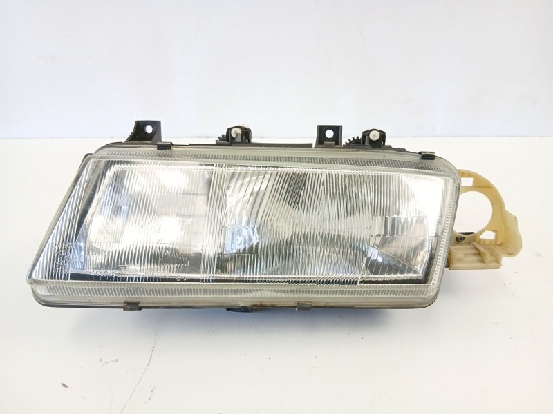 Recambio de faro izquierdo para lancia delta ii (836_) 1.4 i.e. (836af, 836ah) referencia OEM IAM 7791392  