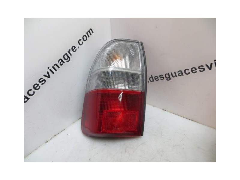 Recambio de piloto trasero izquierdo para mitsubishi l 200 (k60t) 2.5 diesel referencia OEM IAM BLANCO Y ROJO  