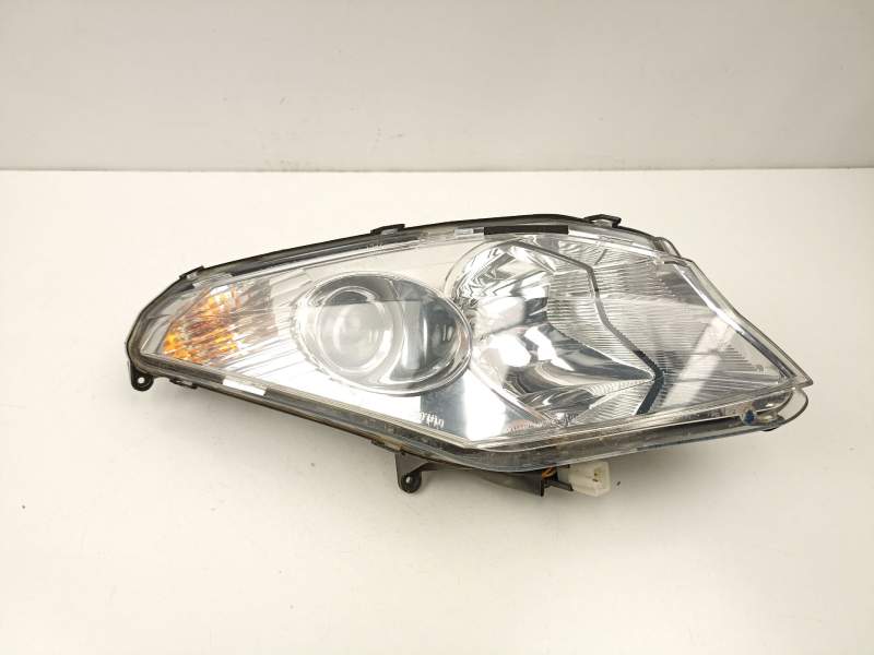 Recambio de faro izquierdo para peugeot satelis satelis 250 (j2) referencia OEM IAM 766941  