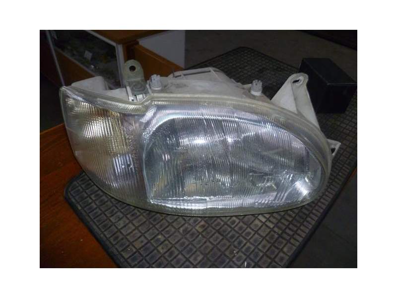 Recambio de faro derecho para ford escort 1.8 d /rfs referencia OEM IAM PLASTICO  